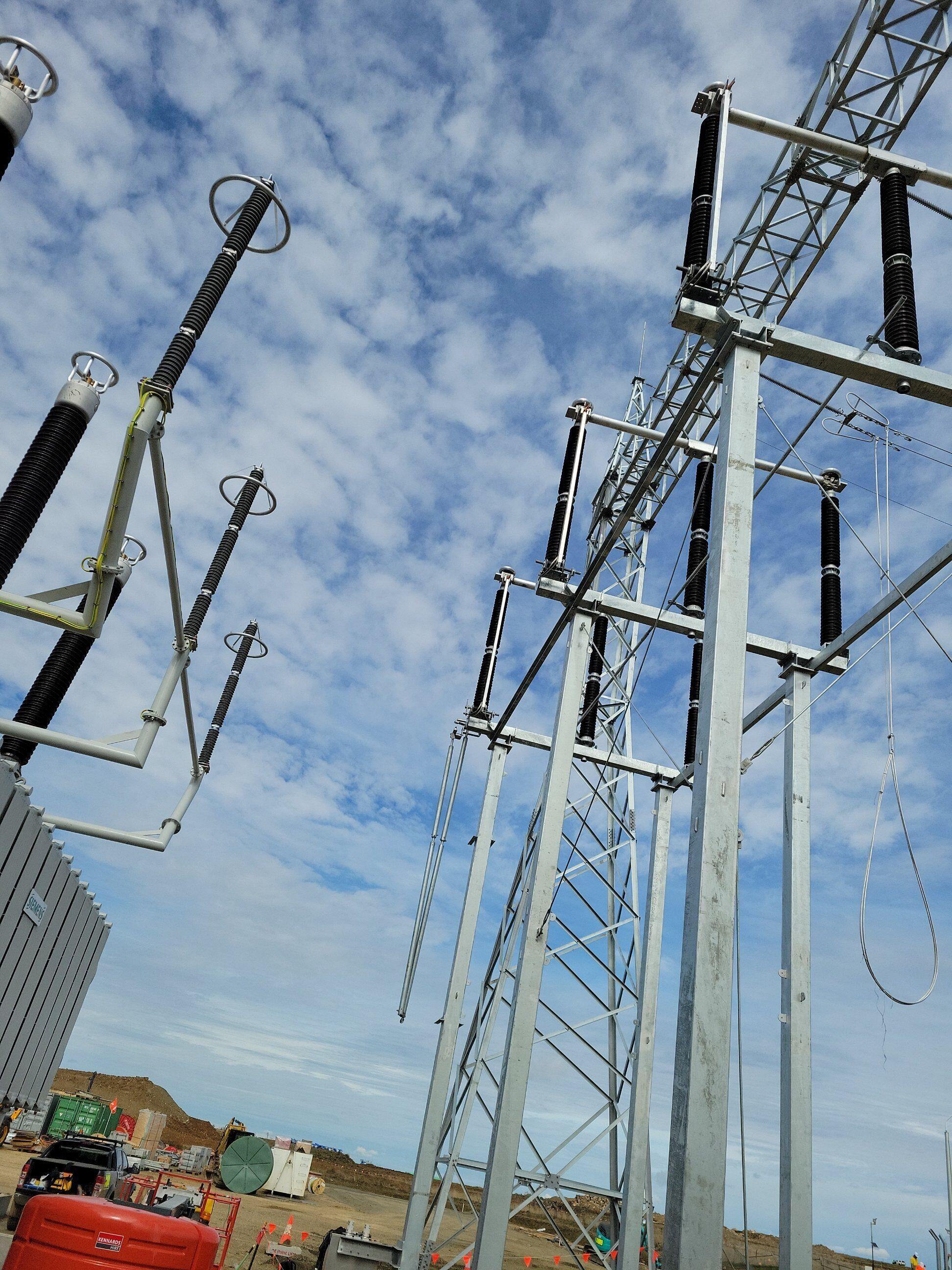 New high voltage steel structures and disconnectors going up on a substation site